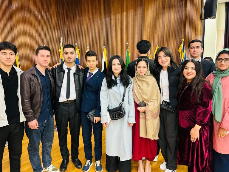 Group of international students at a ceremony